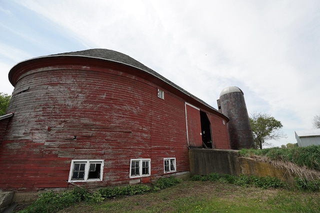 1511 Becker School Rd, Freeport, IL 61032 - view of home's exterior with a barn and an outdoor structure
