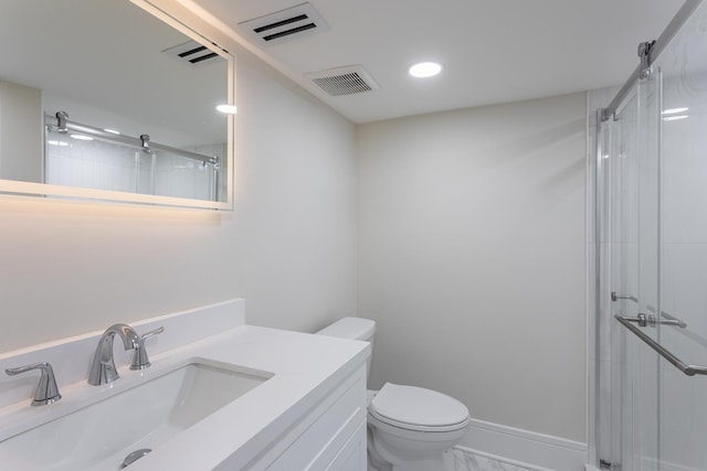 full bathroom featuring a stall shower, marble look tile flooring, toilet, recessed lighting, and vanity