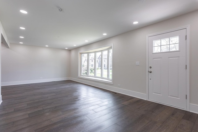 entrance foyer with healthy amount of natural light, dark wood-style flooring, baseboards, and recessed lighting