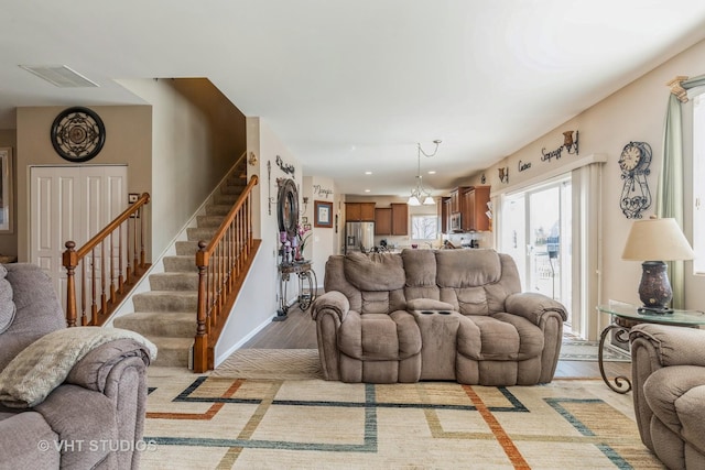 3313 Christopher Ln, Johnsburg, IL 60051 - living room featuring light wood-type flooring, stairs, baseboards, and recessed lighting