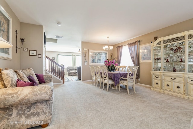 3313 Christopher Ln, Johnsburg, IL 60051 - dining area with a chandelier, plenty of natural light, and light carpet