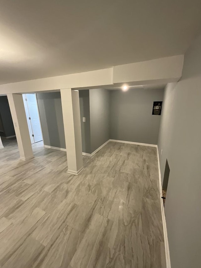 6954 S Prairie Ave, Chicago, IL 60637 - finished basement with baseboards and light wood-style floors