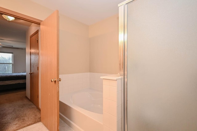 1467 S Candlestick Way, Waukegan, IL 60085 - bathroom with a bath, ensuite bathroom, tile patterned floors, and a stall shower