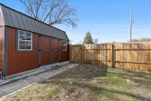 view of shed with fence