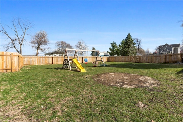 view of yard with a playground
