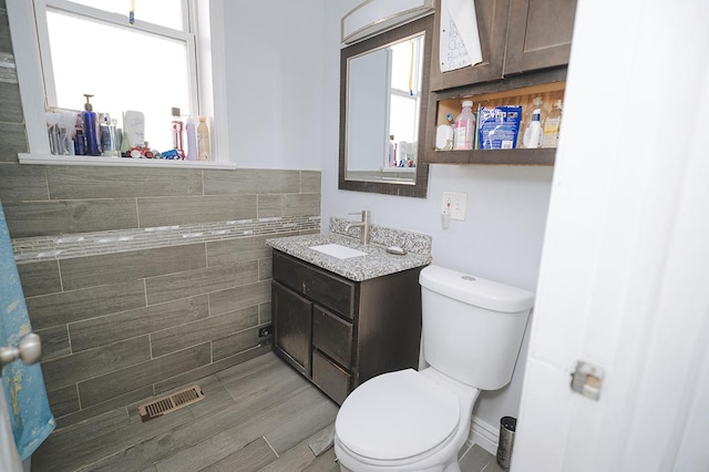 5631 S Throop St, Chicago, IL 60636 - bathroom featuring toilet and vanity