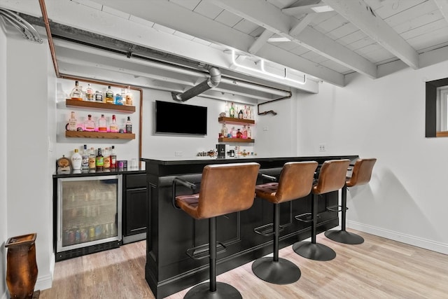 11026 S S Ave H, Chicago, IL 60617 - indoor dry bar with beverage cooler, light wood finished floors, beamed ceiling, baseboards, and wooden ceiling