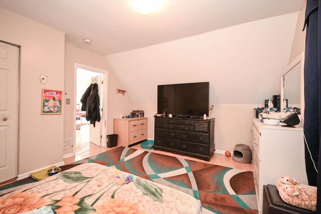 1423 Victoria Ave, North Chicago, IL 60064 - bedroom featuring vaulted ceiling and baseboards
