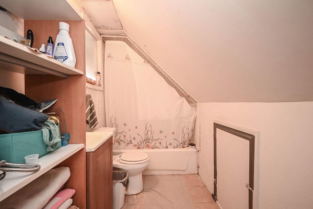 1423 Victoria Ave, North Chicago, IL 60064 - full bath featuring tile patterned floors, shower / tub combo with curtain, toilet, and lofted ceiling