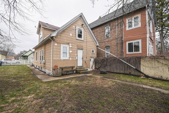 1423 Victoria Ave, North Chicago, IL 60064 - back of property with entry steps and fence