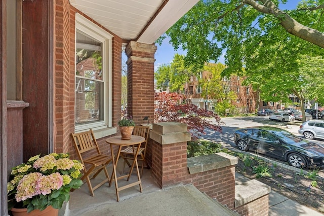 balcony featuring a porch