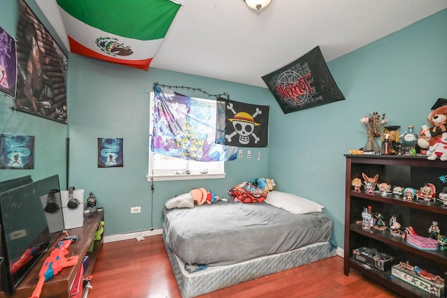 1911 Elizabeth Ave, North Chicago, IL 60064 - bedroom with wood finished floors and baseboards