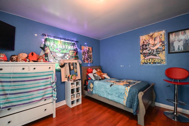 1911 Elizabeth Ave, North Chicago, IL 60064 - bedroom with wood finished floors and baseboards