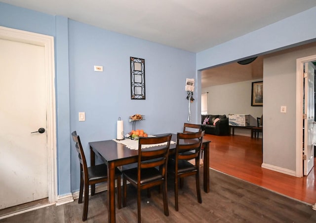 1911 Elizabeth Ave, North Chicago, IL 60064 - dining area with wood finished floors and baseboards