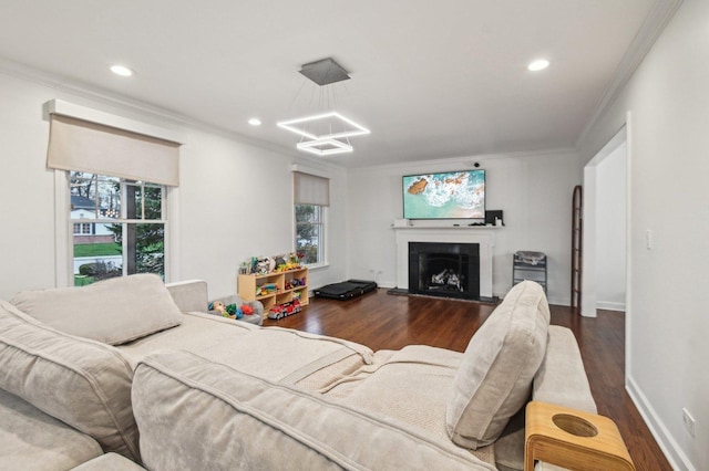 635 Ambleside Dr, Deerfield, IL 60015 - living room with ornamental molding, wood finished floors, a chandelier, recessed lighting, and a fireplace with raised hearth
