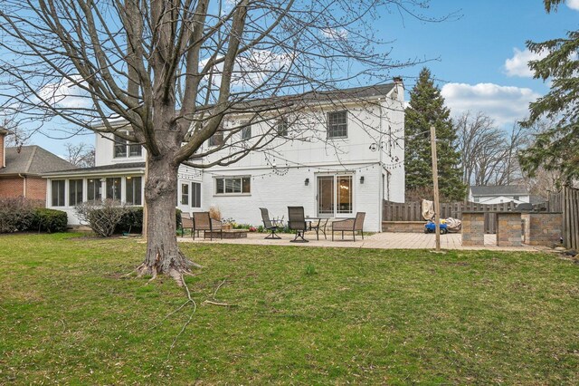635 Ambleside Dr, Deerfield, IL 60015 - back of property with a chimney, a patio area, and brick siding