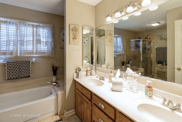 772 Red Oak Dr, Bartlett, IL 60103 - full bath featuring a stall shower, a garden tub, double vanity, and tile patterned flooring
