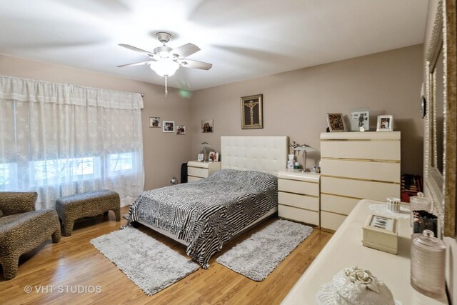 772 Red Oak Dr, Bartlett, IL 60103 - bedroom with wood finished floors and a ceiling fan