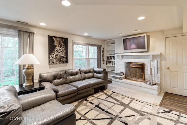 772 Red Oak Dr, Bartlett, IL 60103 - living room with recessed lighting and a brick fireplace
