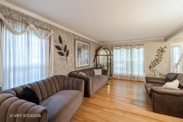 772 Red Oak Dr, Bartlett, IL 60103 - living area featuring healthy amount of natural light, light wood finished floors, ornamental molding, and wallpapered walls