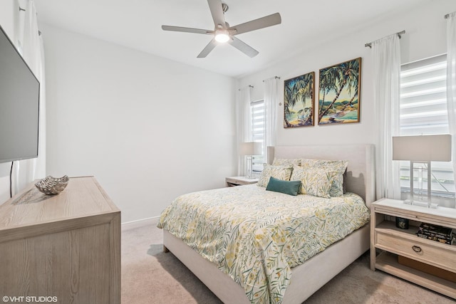 12060 Lake Trail Ln, Parkland, FL 33076 - bedroom with carpet floors, multiple windows, baseboards, and a ceiling fan