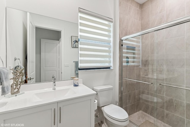12060 Lake Trail Ln, Parkland, FL 33076 - full bathroom featuring a shower stall, toilet, and vanity