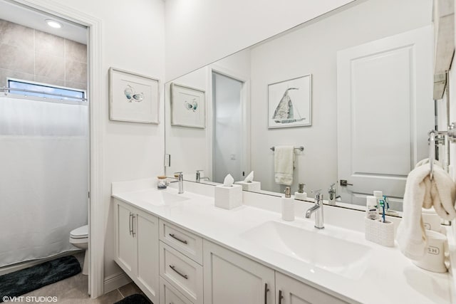 12060 Lake Trail Ln, Parkland, FL 33076 - bathroom featuring toilet, double vanity, a shower with curtain, and tile patterned floors