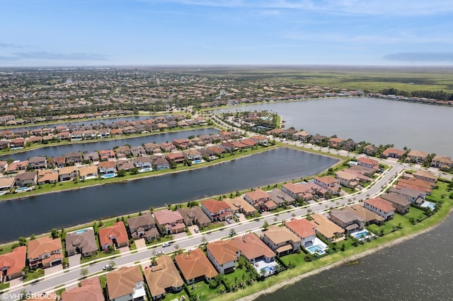 12060 Lake Trail Ln, Parkland, FL 33076 - aerial view of property and surrounding area featuring nearby suburban area and a large body of water