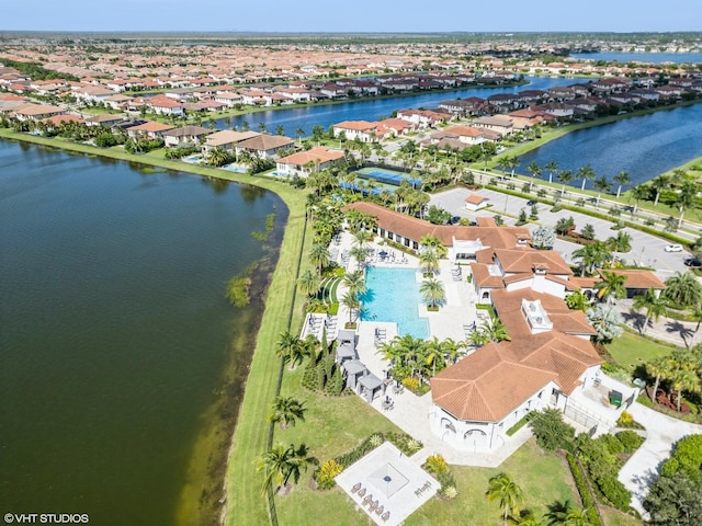 12060 Lake Trail Ln, Parkland, FL 33076 - aerial perspective of suburban area featuring a large body of water and a pool