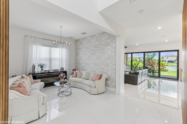 12060 Lake Trail Ln, Parkland, FL 33076 - living area featuring tile patterned floors and a chandelier