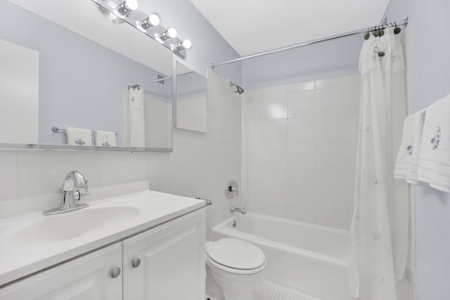 full bathroom with shower / bathtub combination with curtain, vanity, and toilet