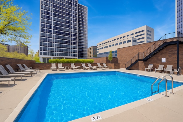 community pool featuring a patio