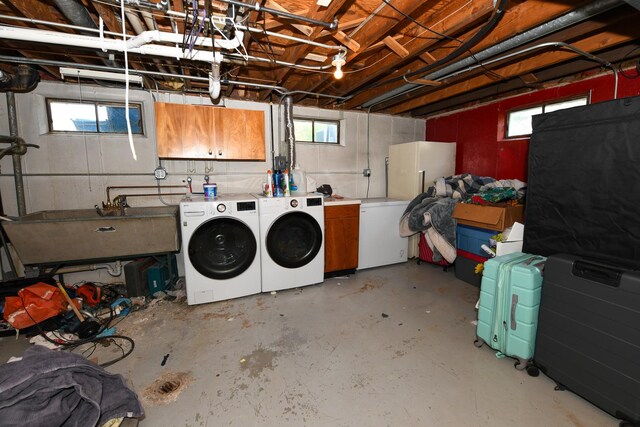 41066 N 3rd St, Antioch, IL 60002 - below grade area with washing machine and clothes dryer, refrigerator, and a sink