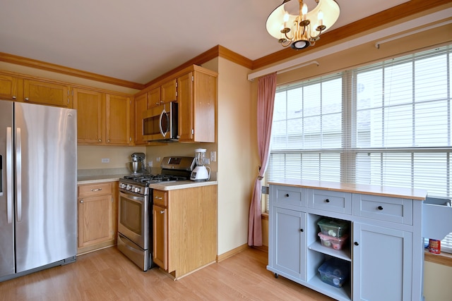 2209 Beaumont Ct, Aurora, IL 60502 - kitchen featuring appliances with stainless steel finishes, light countertops, light wood-style flooring, a chandelier, and open shelves