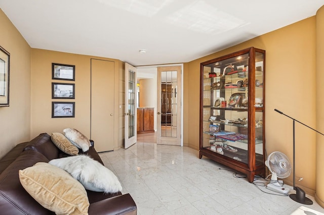 505 N Lake Shore Dr Unit 4907, Chicago, IL 60611 - living area featuring french doors and light marble finish flooring