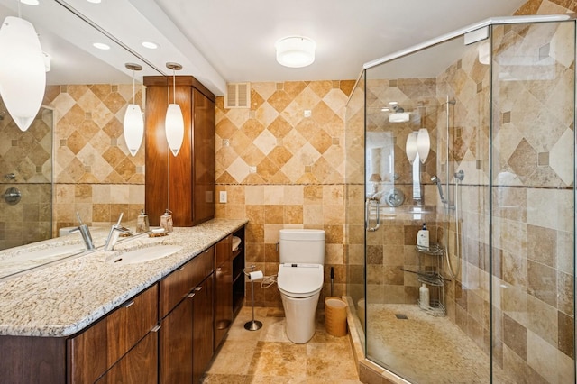 505 N Lake Shore Dr Unit 4907, Chicago, IL 60611 - full bath with tile walls, a stall shower, toilet, vanity, and recessed lighting