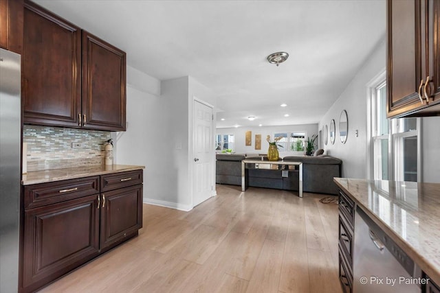 9 N Walnut Ct, Streamwood, IL 60107 - kitchen with light wood-type flooring, backsplash, light stone counters, dark brown cabinetry, and recessed lighting