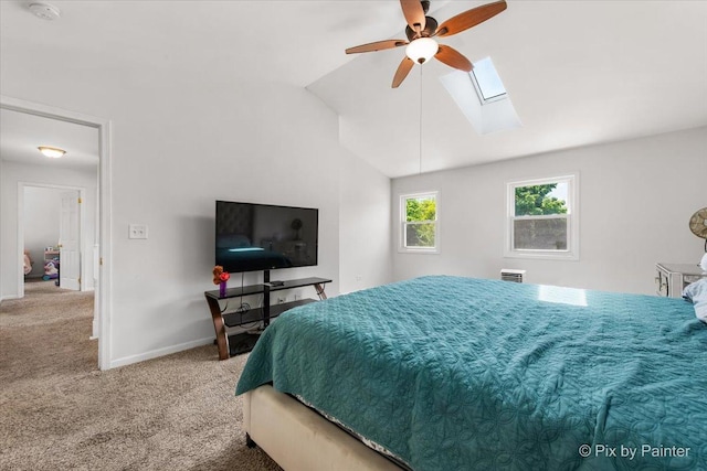 9 N Walnut Ct, Streamwood, IL 60107 - bedroom with carpet floors, a skylight, baseboards, lofted ceiling, and ceiling fan