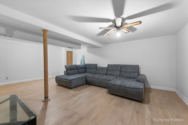 9 N Walnut Ct, Streamwood, IL 60107 - living room featuring light wood-type flooring, baseboards, and ceiling fan