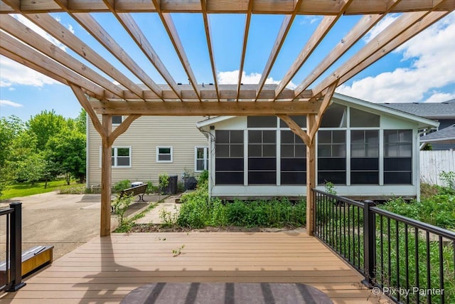 9 N Walnut Ct, Streamwood, IL 60107 - deck featuring a sunroom and a patio
