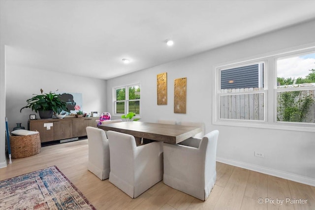 9 N Walnut Ct, Streamwood, IL 60107 - dining area with light wood-type flooring and baseboards