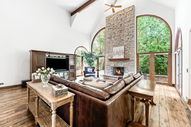 3113 Turnberry Rd, Saint Charles, IL 60174 - living area featuring high vaulted ceiling, light wood-style floors, ceiling fan, a fireplace, and baseboards