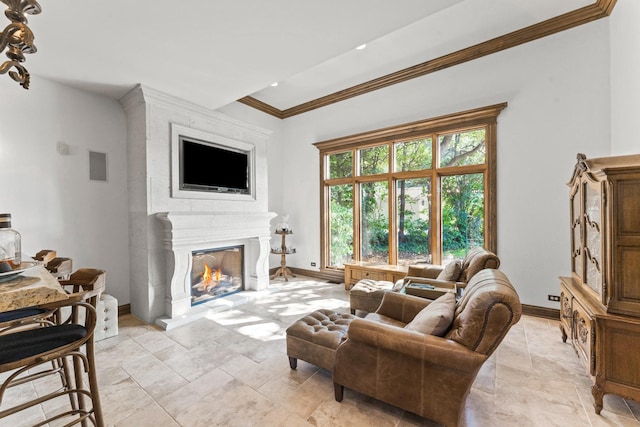 3113 Turnberry Rd, Saint Charles, IL 60174 - living area featuring ornamental molding, baseboards, a lit fireplace, light stone finish flooring, and recessed lighting