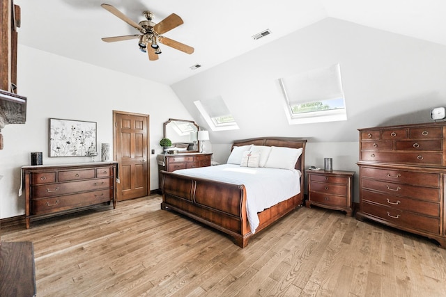 3113 Turnberry Rd, Saint Charles, IL 60174 - bedroom featuring a skylight, vaulted ceiling, light wood-type flooring, and ceiling fan