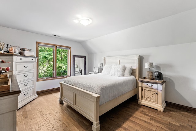 3113 Turnberry Rd, Saint Charles, IL 60174 - bedroom with vaulted ceiling, wood finished floors, and baseboards