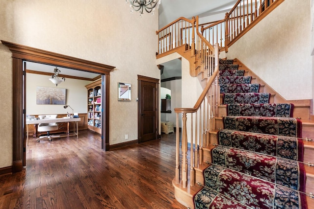 3113 Turnberry Rd, Saint Charles, IL 60174 - stairway with wood finished floors, a high ceiling, baseboards, and crown molding