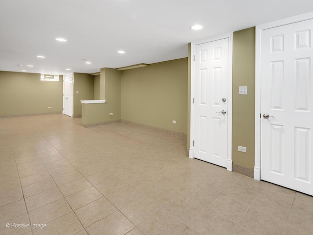 2384 Magnolia St, Des Plaines, IL 60018 - finished below grade area featuring recessed lighting, light tile patterned flooring, and baseboards