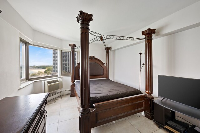 7337 S S Shore Dr Unit 1227, Chicago, IL 60649 - bedroom with light tile patterned flooring and a baseboard radiator