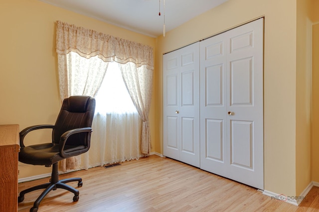 office area featuring wood finished floors and baseboards