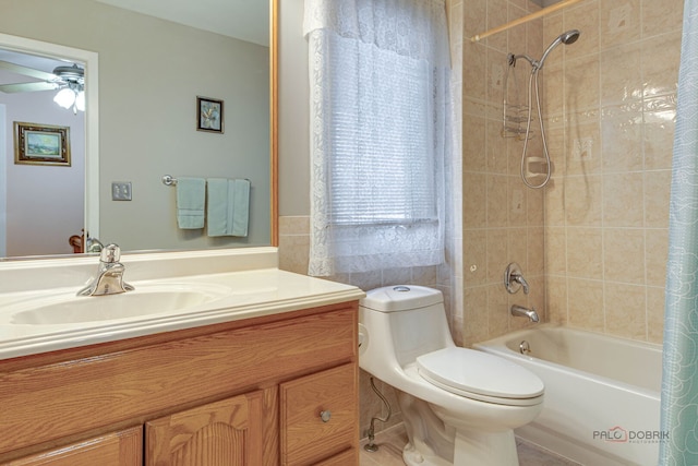 full bath with toilet, ceiling fan, shower / bath combo, vanity, and tile walls